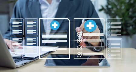 Doctor using online medical record system to check and update patient data. Smart healthcare...