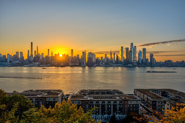 The skyline of Midtown Manhattan in New York at sunrise seen from Weehawken, New Jersey