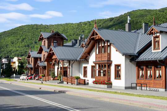 RYTRO, POLAND - JULY 12, 2025: A stunning Swiss-style villa, partly wooden, partly brick.