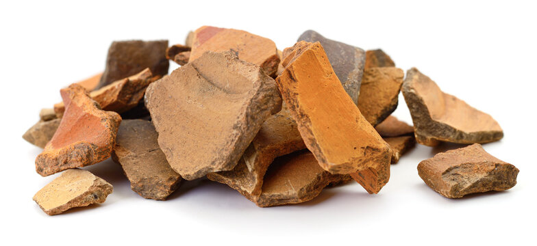 Heap of pottery shards isolated.