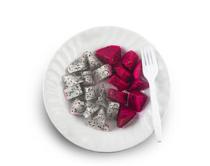 red and white dragonfruit slices on a white plate isolated