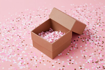 Box Brown Gift Open with Pink Confetti on Pastel Pink