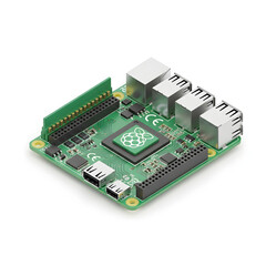 A green Raspberry Pi computer board, showcasing its ports and processor.