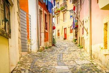 Fototapeten street in old town of Lisbon © neirfy
