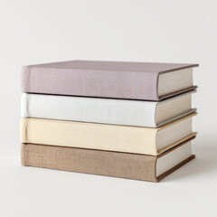 Fototapeta premium Soft Pink and Tan Stacked Books on Cream Background
