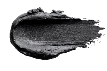 Black textured smear on a dark background showcasing cosmetic beauty product