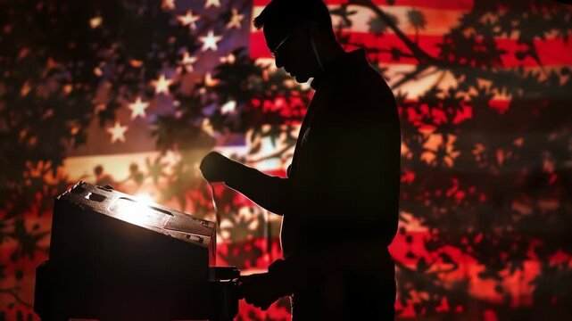 Silhouette of Person Voting in Ballot Box Against American Flag - A silhouette of a person casting a ballot into a voting machine is shown against a blurred background of an American flag with