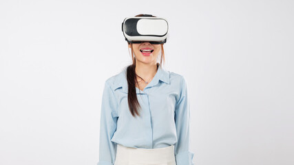 Young asian woman wearing vr glasses explores virtual reality tech, excited about the future using vr and waving with a smile, experiencing the reality, isolated studio white background