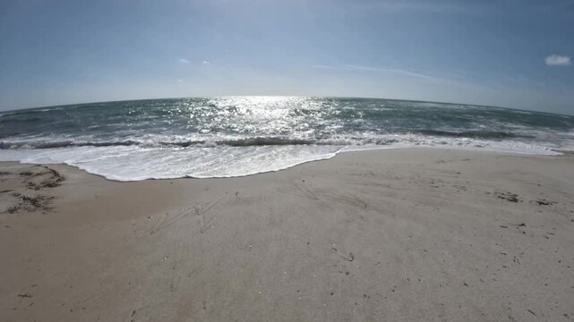 Maimoni beach in Sardinia with rough seas.