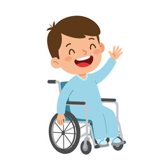 Smiling boy in a blue hospital gown sits in a wheelchair and waves his hand cheerfully.
