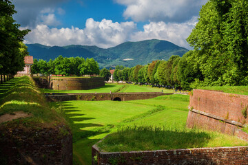 Lucca city walls beautiful park with Mount Pisano from Santa Croce (St Cross) Bulwark