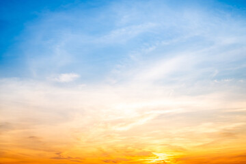 Beautiful , luxury soft gradient orange gold clouds and sunlight on the blue sky perfect for the background, take in evening,Twilight, Large size, high definition landscape photo
