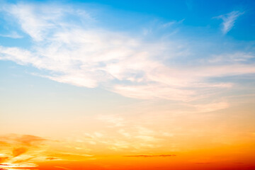 Beautiful , luxury soft gradient orange gold clouds and sunlight on the blue sky perfect for the background, take in evening,Twilight, Large size, high definition landscape photo