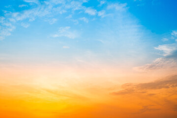 Beautiful , luxury soft gradient orange gold clouds and sunlight on the blue sky perfect for the background, take in evening,Twilight, Large size, high definition landscape photo