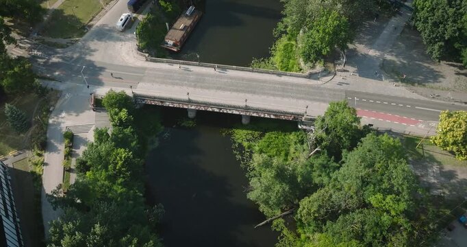High-angle tracking shot of Olawa River in Wroclaw, Poland.