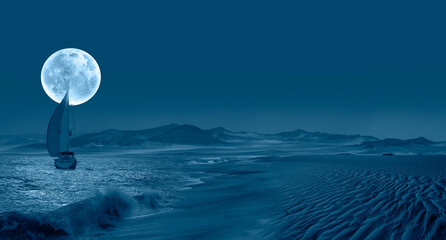 White lonely yacht is sailing near coast full moon in the background at night - Namib desert with...