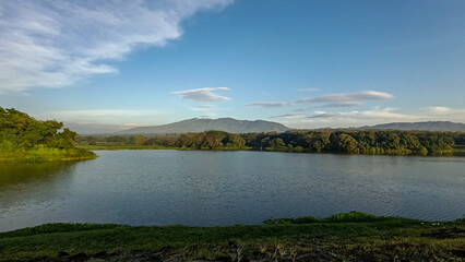 A truly beautiful view in the morning. The sky was so clear and blue. The reservoir was set against a backdrop of hills and mountains.