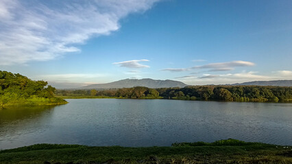 A truly beautiful view in the morning. The sky was so clear and blue. The reservoir was set against a backdrop of hills and mountains.