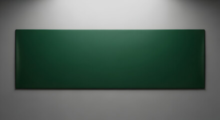 Empty green chalkboard mounted on a gray classroom wall with soft lighting ideal for educational presentations and teaching environments