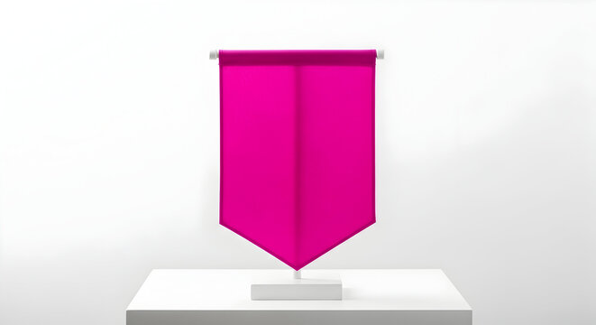 Elegant pink fabric banner display on white pedestal for event decoration or promotional purposes with clean background and modern design