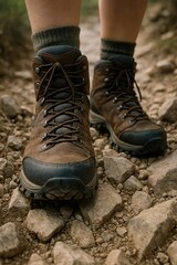 Hiking boots on rocky terrain closeup