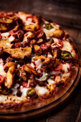 Gyros Pizza with jalapeno pepper, cherry tomatoes and mozzarella cheese. Soft focus. Close up.	