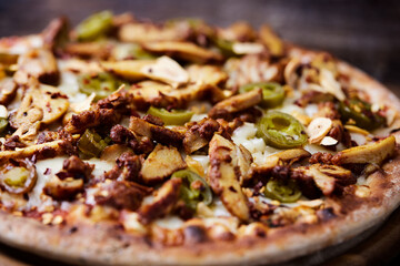 Gyros Pizza with jalapeno pepper and mozzarella cheese. Soft focus. Close up.	