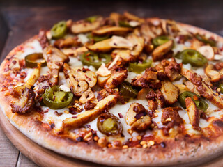 Gyros Pizza with jalapeno pepper and mozzarella cheese. Soft focus. Close up.