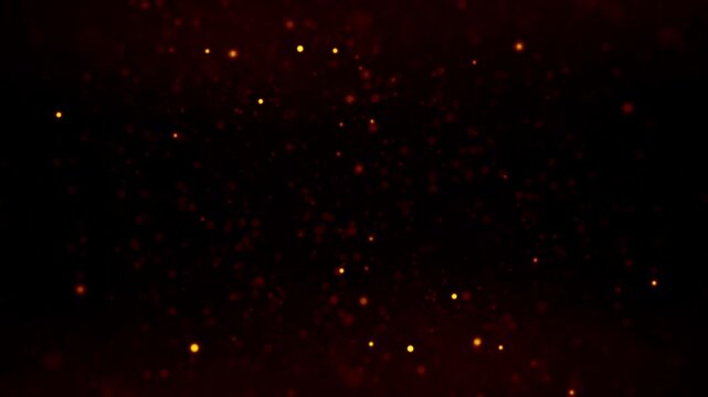 Abstract loop animation flickering glow orange gold dust particles floating on black background . Seamless loop orange bokeh particles dust fly in the air. 