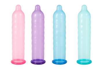 Set of multi-colored unrolled latex condoms, on an isolated background. Condoms, contraceptives for safe sex, prevention of STDs, sexual health.