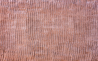 Red brown concrete wall texture, abstract background, copy space.