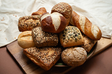 Different types of crusty German breads and flaky pastries