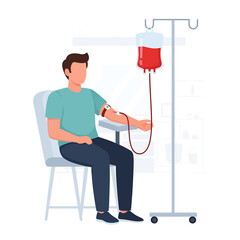 Man sitting in a chair donating blood, with a blood bag hanging from a stand, in a medical setting.