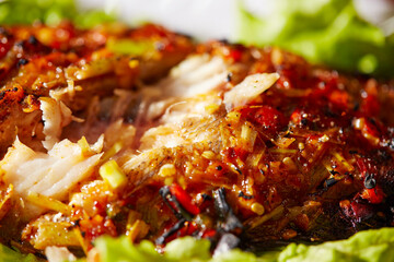 Grilled fish with spicy seasoning