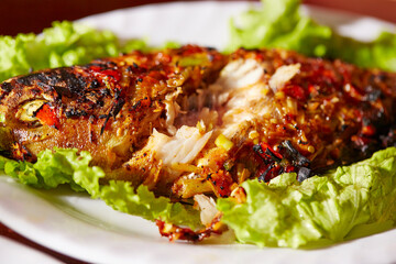 Grilled fish with spicy seasoning