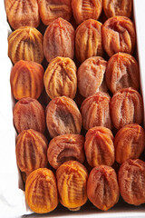 Dried persimmons in a box