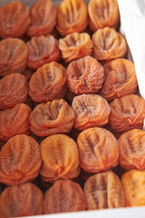 Dried persimmons in a box