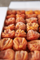 Dried persimmons in a box