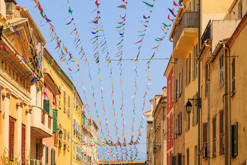 Colorful street decorations between buildings in Ajaccio old town, France, Corsica, Ajaccio, 13...