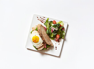 Sandwich with salad on a plate