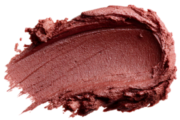 Macro close-up shot of a bronze color lipstick smudge on a black background