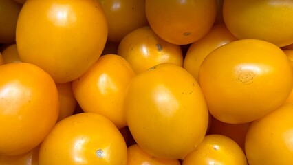 Fresh tomatoes. Vegetarian, vegan and raw food and diet.Food background. From the farm to the table. Vegetable food.