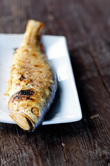 grilled fish on a plate 