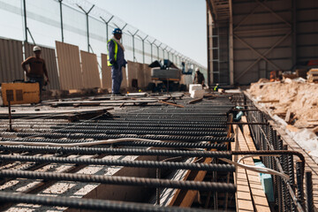 Naklejka premium Construction Process – Preparation for Concrete Pouring at Building Site