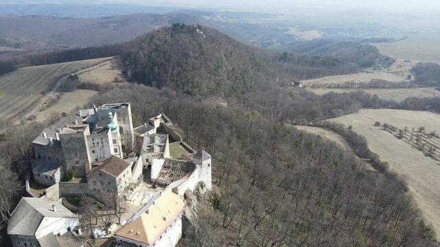 Medieval royal castle Buchlov in South Moravia, Czech Republic captured on drone video. Autumn nature, forests, castle. Drone video.