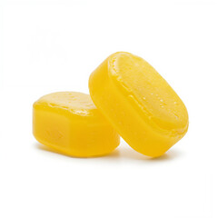Yellow candies  on white background , isolated