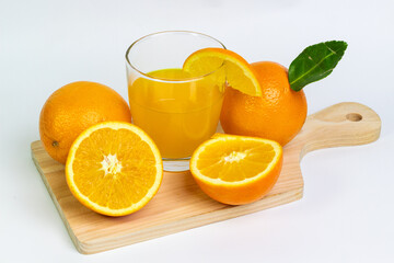 Freshly Squeezed Orange Juice in Glass with Citrus Fruits on Wooden Board Vitamin C Rich Beverage for Healthy Lifestyle and Nutritious Diet Promoting Wellness and Natural Taste Refreshing Drink