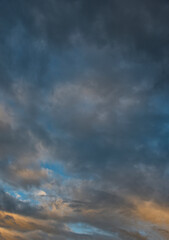 Russia. The South of Western Siberia. Panorama of the evening summer sky with multicolored clouds over the fields of Kuznetsk Alatau.