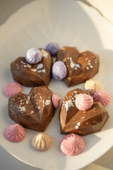 Decorative chocolate hearts with spots