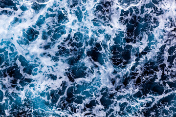 Sea water texture. Top view of stunning water with foam. Can be used in covers, packaging, posters, textures, wallpapers, art and design projects. Vibrant vector illustration.